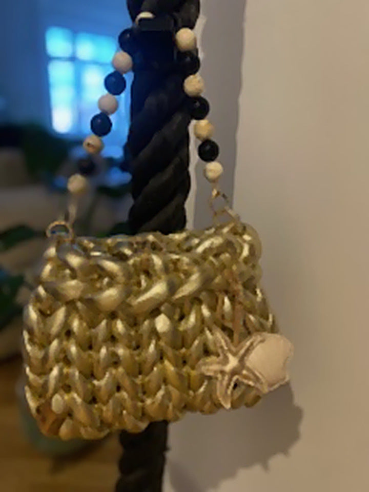 Coastal Glow Bag — gold chunky knit bag with beaded strap and starfish and shell charms