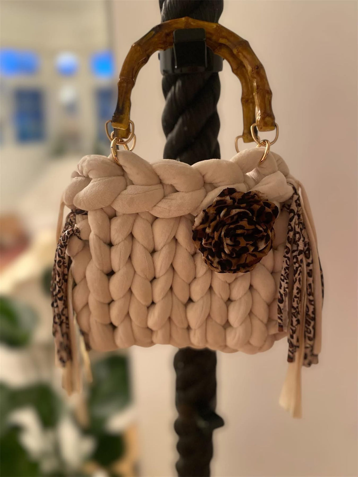 Nani Savannah — cream chunky knit bag with bamboo handle and leopard rosette