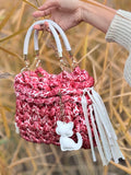 Rose Jungle — pink leopard print chunky knit bag with white rope handles and cat charm