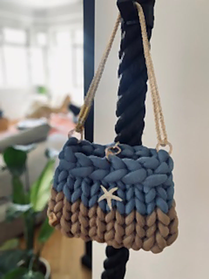 Sandy Shore Bag — two-tone blue and sand chunky knit bag with gold rope strap